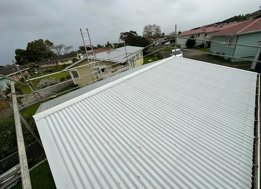 Garage and carport re-roofing on an Auckland property with new roofing sheets