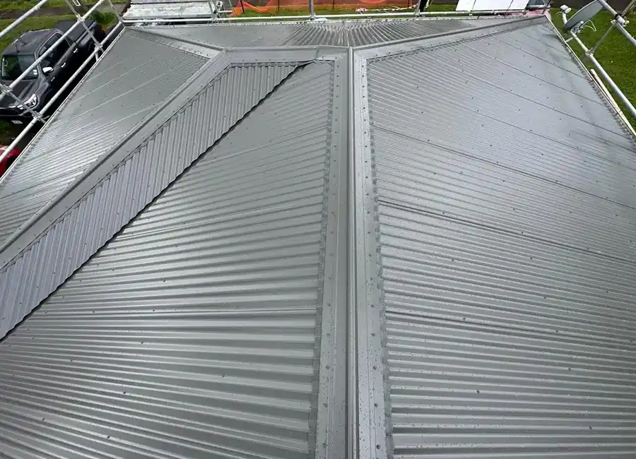 New metal roofing installed on an Auckland home with long-run steel sheets